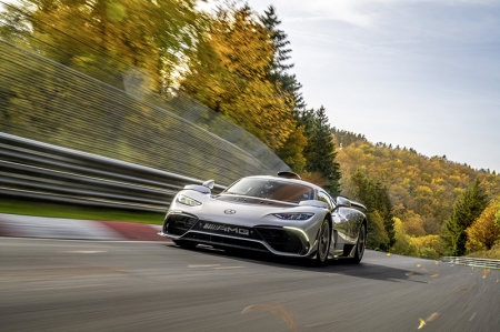 Formula One hasn’t turned a wheel in anger at the Nuburgring’s Nordschleife since 1976, but now, it’s back with a bang. That’s because Mercedes-AMG has just claimed the  Green Hell lap record with its One hypercar, with a 6min 35.183sec lap around the 20.8km circuit. 

That’s 8 seconds faster than the previous record for road-legal cars, the Porsche 911 GT2 RS MR (a GT2 RS with aero and handling mods by Manthey Racing), and 13 seconds faster than the previous production car record holder, the Mercedes-AMG GT Black Series.