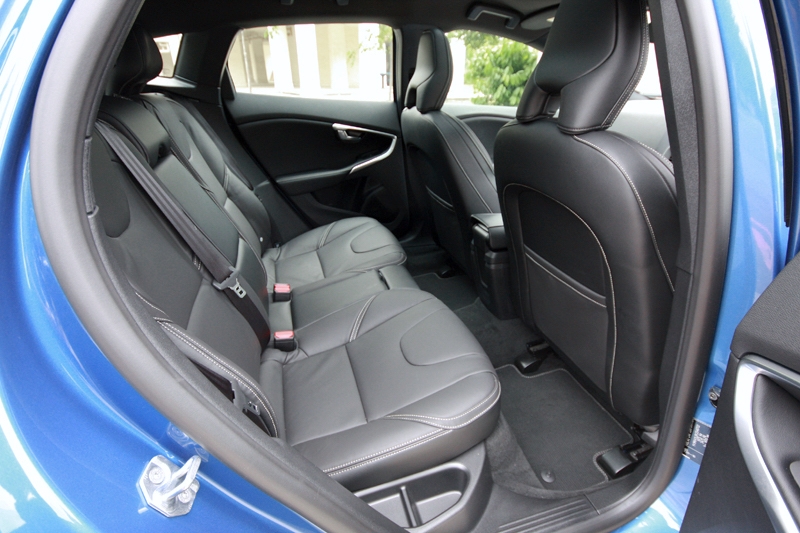 Rear seat offers sufficient leg, head and shoulder rooms for up to three average-sized adults