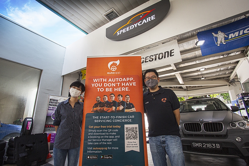 Ms Lim Yu Xin (left), Executive for SpeedyCare and Mr Alvin Tan (right), Ignition Labs Chief Operations Officer, officially launch the collaboration between AutoApp and SPC SpeedyCare at SPC Toa Payoh