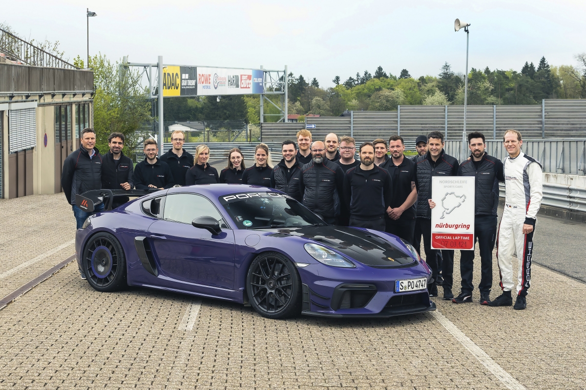 Jörg Bergmeister (right) sets the time of 7:03.121 minutes in a Manthey Kit 718 Cayman GT4 RS