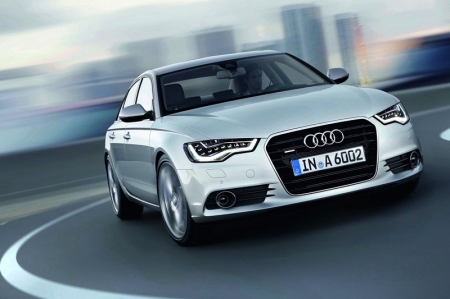 The chassis of the new A6 combines sporty precision with supreme comfort,
with links made of aluminium and a redesigned power steering that features a
highly efficient electromechanical drive. The executive sedan will also have
wheels ranging from 16 to 20 inches in diameter. The Audi drive select dynamic handling system is standard with the new A6, and the front-wheel- drive models have the sporty ESP with electronic limited slip differential on board. For enhanced comfort, adaptive air suspension with controlled damping and dynamic steering will be available soon as options.