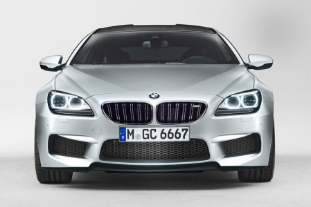 The front of the car is dominated by its large air intakes, standard Adaptive LED Headlights and an M kidney grille designed especially for this model. 