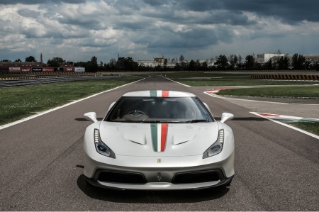 Designed in-house by the Ferrari Styling Centre, the 458 MM Speciale was built on the chassis and running gear of the 458 Speciale. Stylistically, the said owner was looking for extremely sporty lines and specified a ‘visor’ effect for the glasshouse: A black-painted A-pillar, very much in the style of the 1984 Ferrari GTO, helps provide a wraparound effect between the windscreen and side windows which melds into a single, seamless glass surface. This solution simultaneously lowers the roofline and lends an aerodynamic sleekness to the full volume of the swept-back C-pillar.