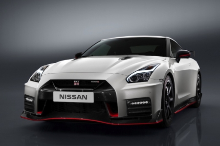 Like the standard car, the GT-R NISMO’s front end features a fresh face with a dramatic new bumper. However on this model, it is made entirely from carbon fibre to reduce weight. Then to help cool the car’s high-output engine, the dark chrome V-motion grille has been enlarged to collect more air; the redesign has been carefully shaped to improve airflow around the vehicle and generate a high level of downforce, while at the same time directing air around the wheels to improve the aerodynamics. The GT-R NISMO generates more downforce than any other Nissan production car to date, which results in exceptional high-speed stability.Power comes from a twin-turbocharged 3.8-litre V6 delivering 592 bhp; the engine features a pair of high-flow, large diameter turbochargers used in GT3 competition, and power is sent to all four wheels via a six-speed dual-clutch paddleshift gearbox.Â 