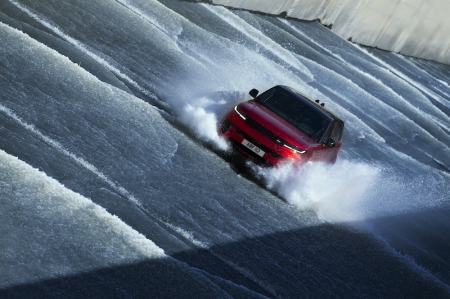 For the new 2023 Range Rover Sport, that involved driving nearly 300m up the spillway of the Karahnjukar Dam in Iceland, against a torrent of water moving at 750 tonnes/min, and up a 25-degree incline. The danger of getting it wrong? A 90m drop off the end of the spillway into the valley below.
