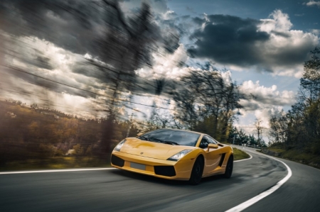 Let's journey back through the corridors of time, where the echoes of roaring engines and the scent of burning rubber still linger. There, we find the genesis of a legend, the Lamborghini Gallardo.

A saga of innovation, determination, and the pursuit of the extraordinary.

