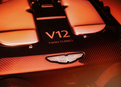 Aston Martin’s V12-engined behemoths - a line that has defined the zenith of grandeur for a quarter-century.

Of course, the firm doesn’t want to give up on its famed engine any time soon, so it recently unravelled the details of a new updated V12, a powerhouse that not only sustains the legacy of its predecessors but propels it into a new era with unmatched gusto.

Boasting 823hp and 1000Nm of torque, this V12 is the result of an extensive overhaul aimed at enhancing every microscopic detail of the combustion cycle.

The technical ballet performed to bring this engine to life includes fortifying the cylinder block and conrods, revamping cylinder heads, and recalibrating camshafts.

The repositioned spark plugs and new, more voluminous fuel injectors orchestrate a symphony of optimised combustion. Meanwhile, the turbochargers promise a responsiveness that can only be described as telepathic.
